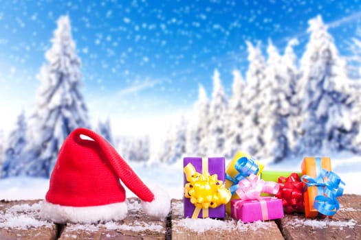 Christmas gifts and winter forest