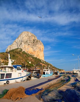 Calpe in alicante with Penon Ifach mountain and marina boats