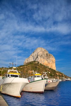 Calpe in alicante with Penon Ifach mountain and marina boats
