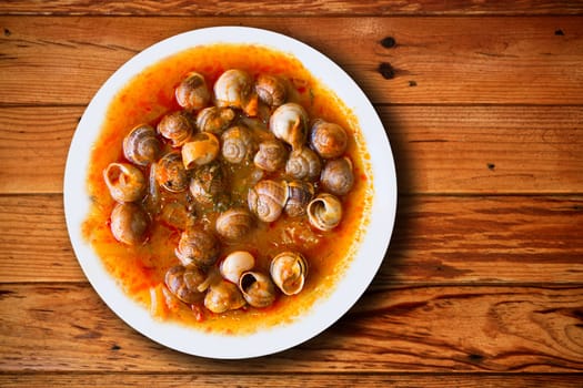 dish of snails prepared at spanish traditional mediterranean style