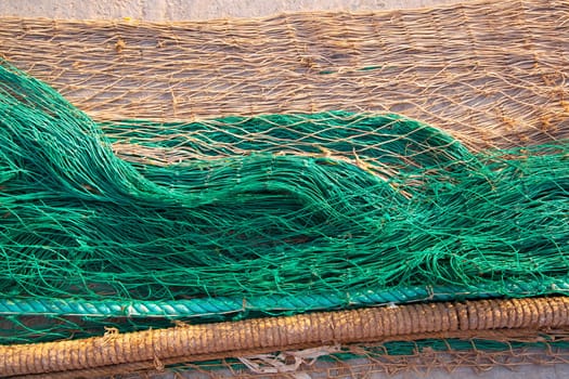 fishing nets texture pattern over soil in green and beige colors