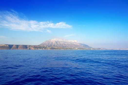 Alicante province Denia village with Mongo viewed from the sea