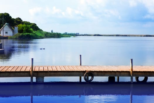 Albufera lake in Valencia El Saler under blue sky