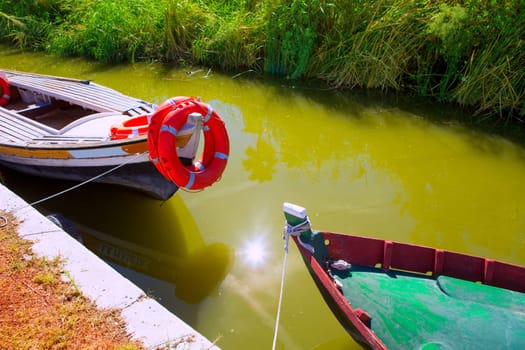 Albufera channel boats in el Palmar of Valencia Spain