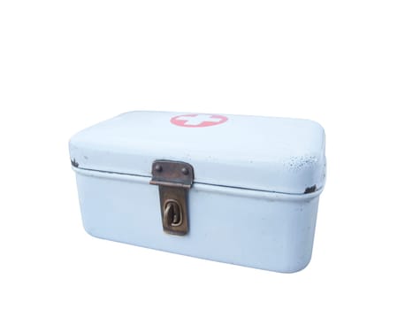old,enameled,white first aid kit with red cross on the top isolated on white