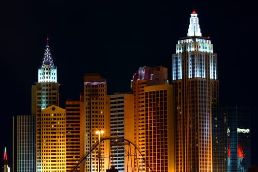 Las Vegas, USA - December 03, 2011: New York New York Hotel and Casino in Las Vegas on Tropicana Avenue and Las Vegas Boulevard seen from the west on a clear night.  The architecture of the resort mirrors the skyline of New York.