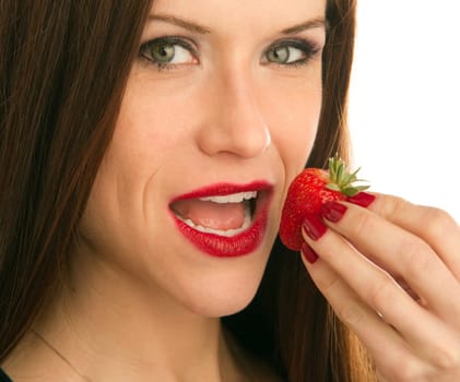 Woman eats Strawberry with her fingers