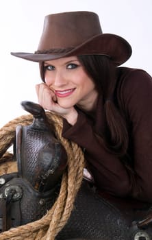 A woman relaxes against her gear