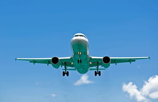 Passenger airplane on final approach, seconds before landing.