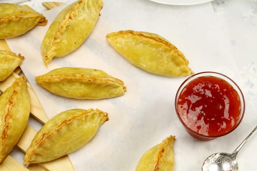 Delicious fresh baked golden pasties with sweet chili relish.