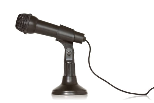 Black dynamic microphone on a white background
