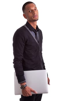 Young african american man holding a laptop, isolated on white background