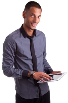 Young african american man using a tablet pc, isolated on white background