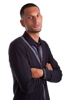 Portrait of a young african american man with folded arms, isolated on white background