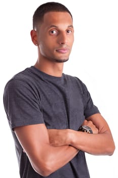 Portrait of a young african american man with folded arms, isolated on white background