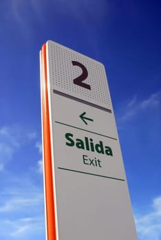 plastic exit signpost with number two and green arrow