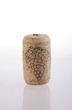 Cork wine with grapes engraving isolated on white background. Included clipping path, so you can easily cut it out and place over the top of a design.