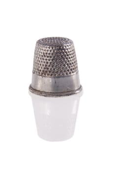 Metal thimbls isolated over white background. Included clipping path in every object, so you can easily cut it out and place over the top of a design.