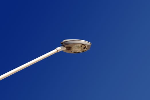 Single column light on blue sky background
