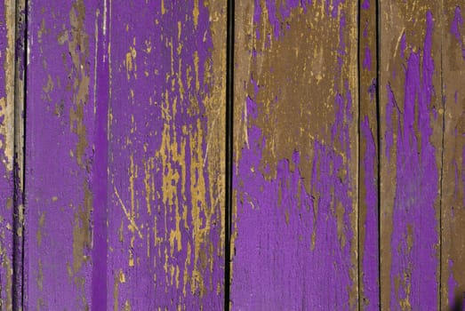 Vintage wooden texture with grunge paint close up. Useful as background for design works.