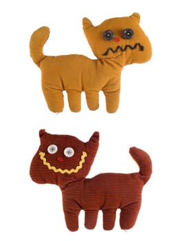 Two fabric teddy cats in beige and brown isolated with on white background.  Included clipping path, so you can easily cut it out and place over the top of a design.