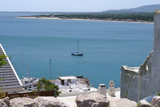 Bay of dreams at international tourism spot with sailing boat. Piriapolis, Maldonado, Uruguay.