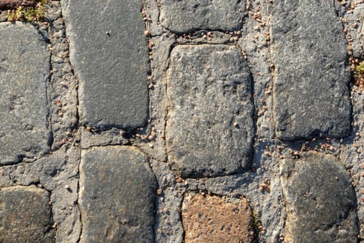 Colonial cobblestone texture at Montevideo city.