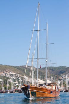 Turkish sailing boat leaving Bodrum harbour , Turkey.