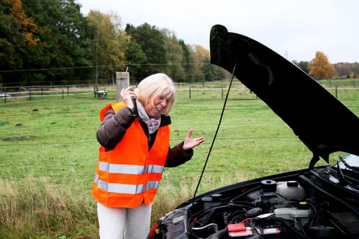 Angry senior citizen has car breakdown
