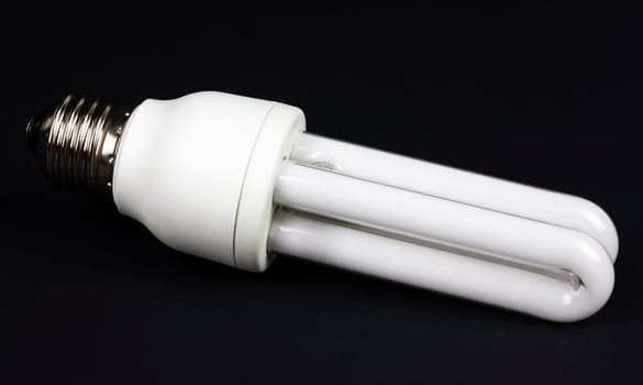 Energy efficiency, light bulb isolated over black