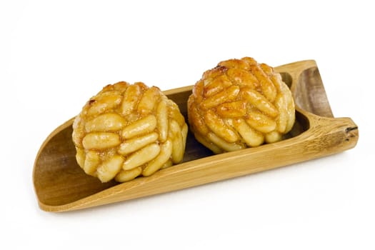Panellet pine nuts isolated on white