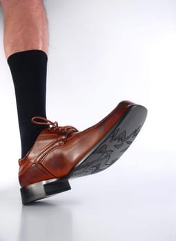Determined step of a businessman in such a hurry that forgot his pants. Wide angle