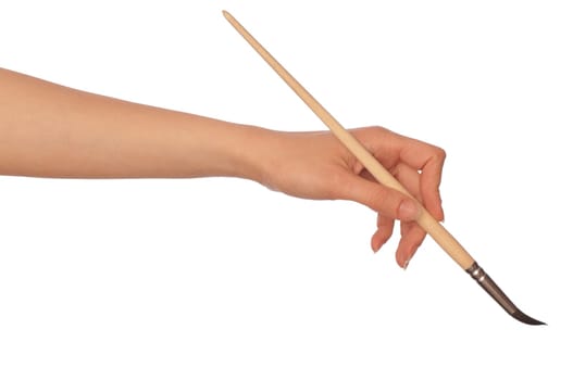 woman drawing a picture with a brush