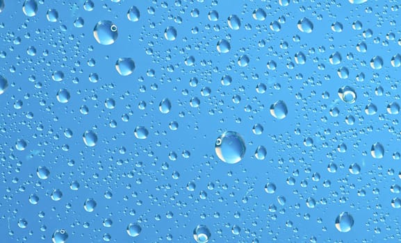 Water bubbles on the window for background