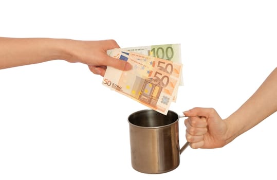 woman giving alms in euro to another woman