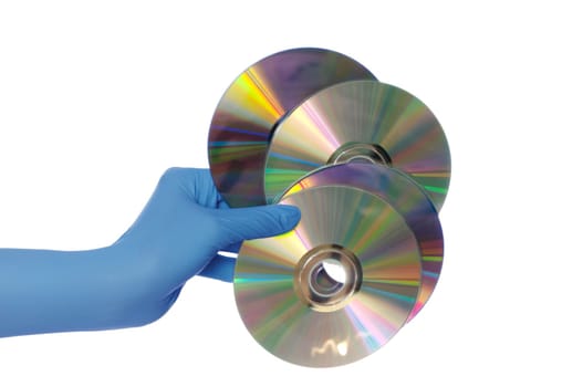 inspector in blue gloves holds in a hand confidential audio and video about hacker programs and viruses