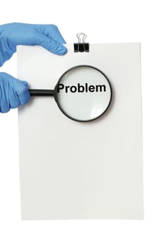 The doctor in blue gloves holds a list of problems in the hands