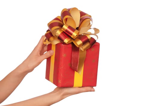 woman giving a red box with yellow bow as a gift