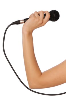 woman holding big black microphone for singing
