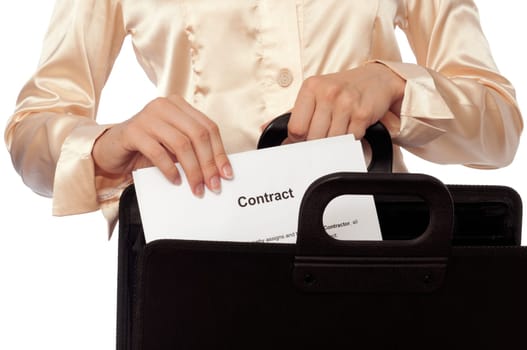 Businesswoman taking out from a suitcase contract for new employees