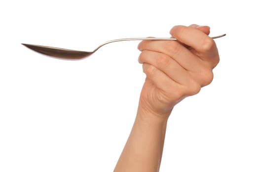 woman holding tablespoon in the hand for feeding a sick person