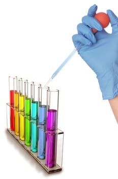 chemist in blue gloves making test in a laboratory with samples