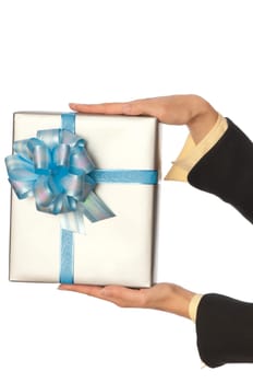 woman giving a silver box with blue bow as a gift