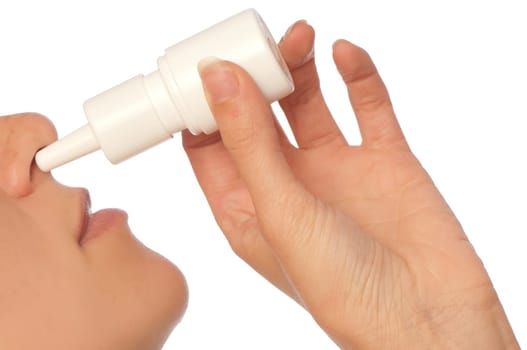 The woman drips drops for a nose for fast recover