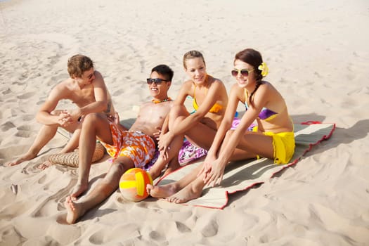 group of young people at the beach