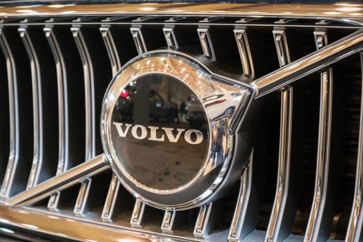 Lisbon, Portugal - May 12, 2023: Volvo electric car logo emblem close up