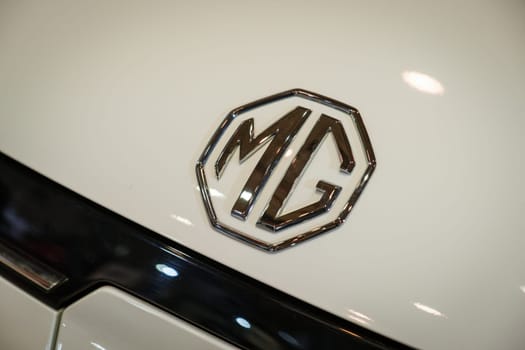 Lisbon, Portugal - May 12, 2023: MG electric car logo emblem close up