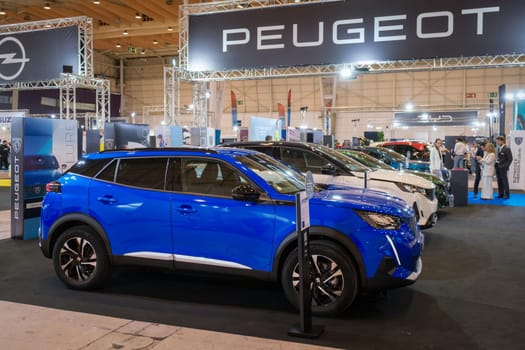 Lisbon, Portugal - May 12, 2023: Peugeot e-2008 electric car on display at ECAR SHOW - Hybrid and Electric Motor Show