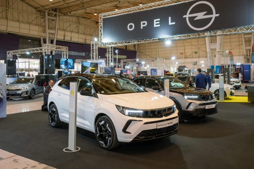 Lisbon, Portugal - May 12, 2023: Opel Grandland GSe hybrid and Opel Mokka electric cars on display at ECAR SHOW - Hybrid and Electric Motor Show
