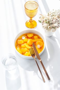 Salmon ceviche in jelly with orange and mango-passion fruit sauce. High quality photo